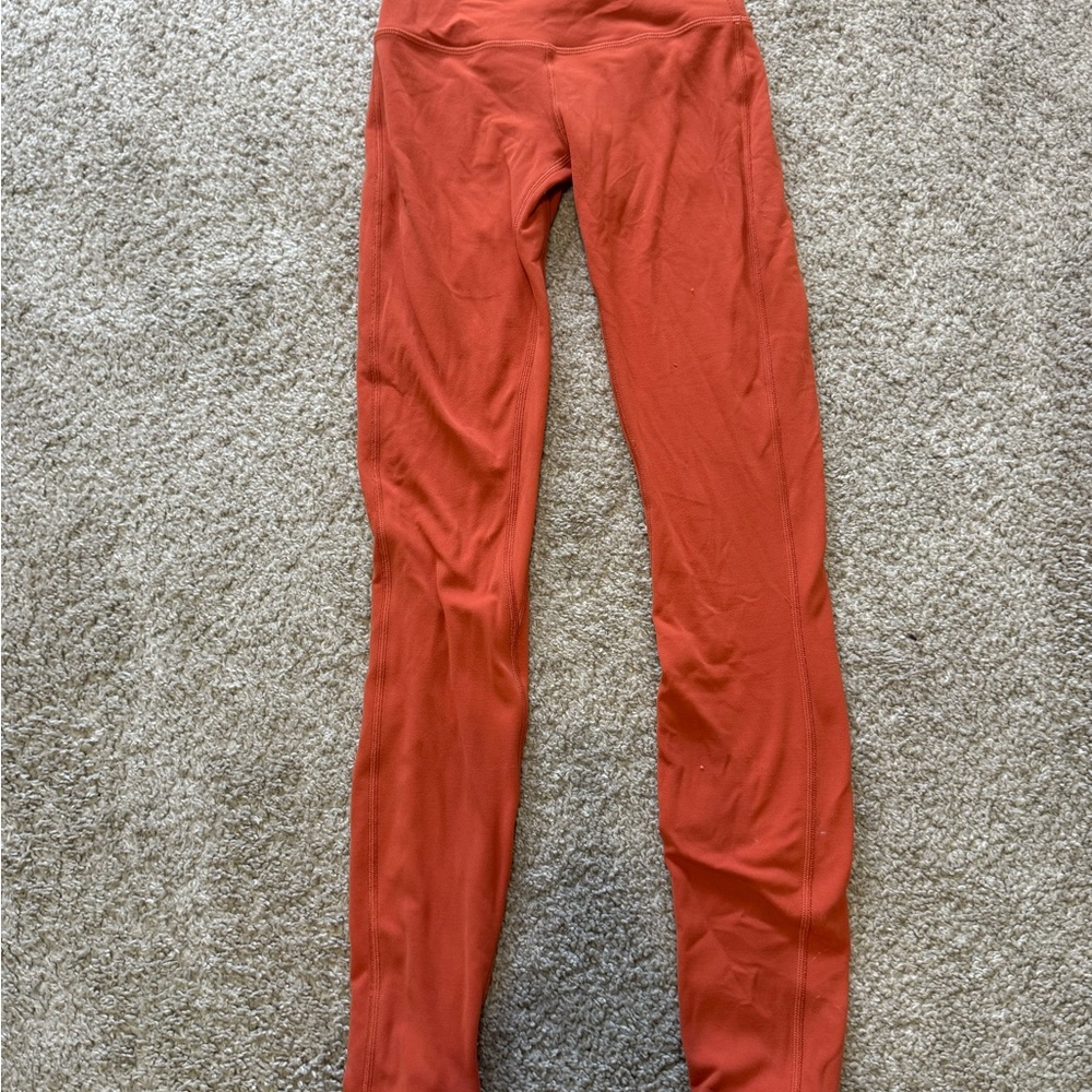 Lululemon Athletica red/orange size 0, 28” leggings.